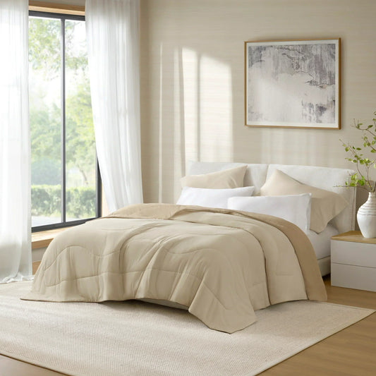 A modern bedroom with neutral-colored bedding