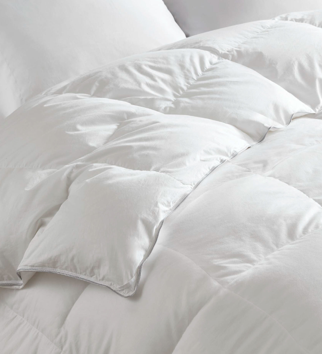  White down comforter slightly folded